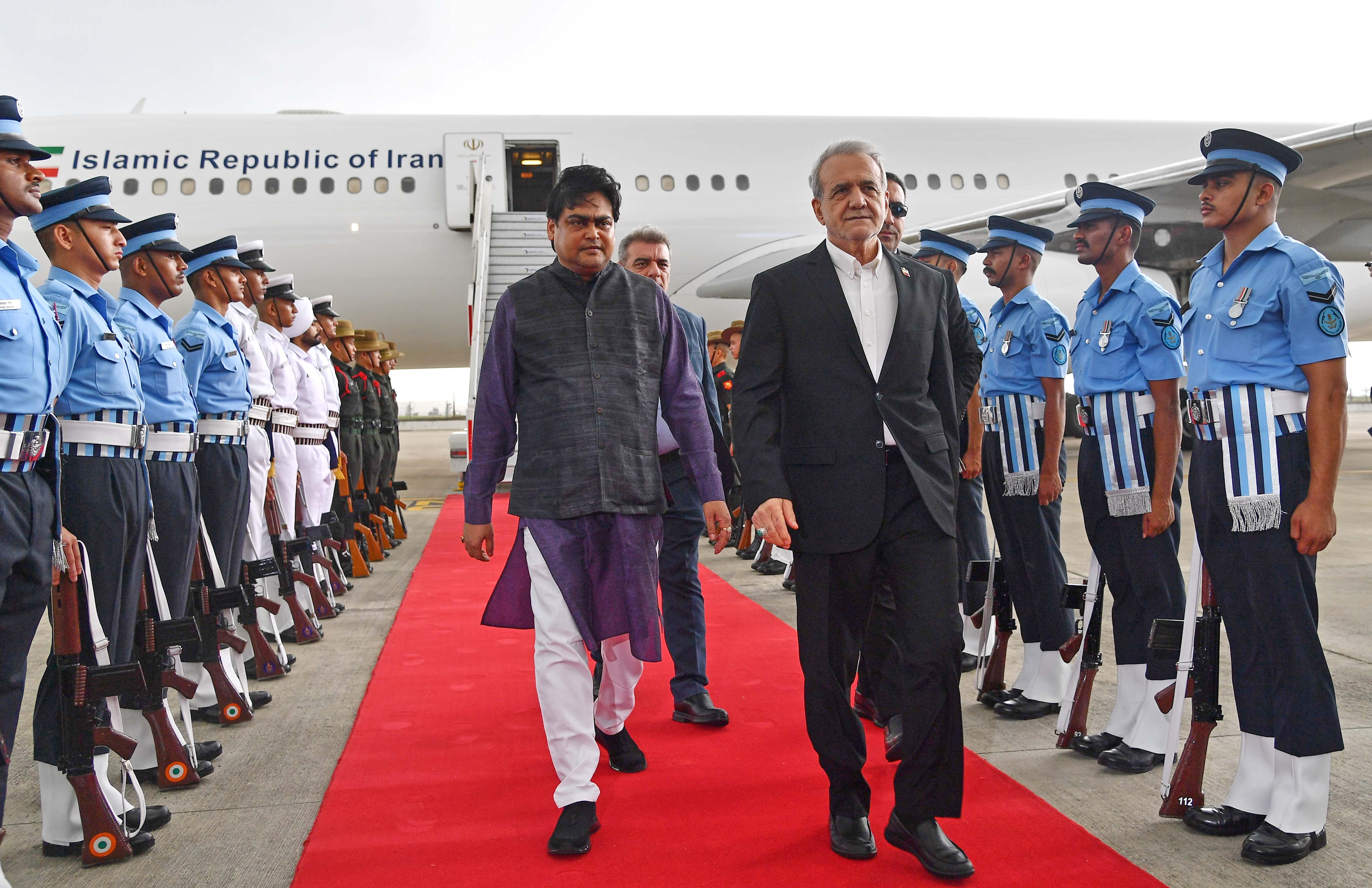 Iranian President Masoud Pezeshkian, center right, arrives for the BRICS summit in New Delhi, India, Friday, Sept. 11, 2026. (Indian Foreign Ministry via AP)